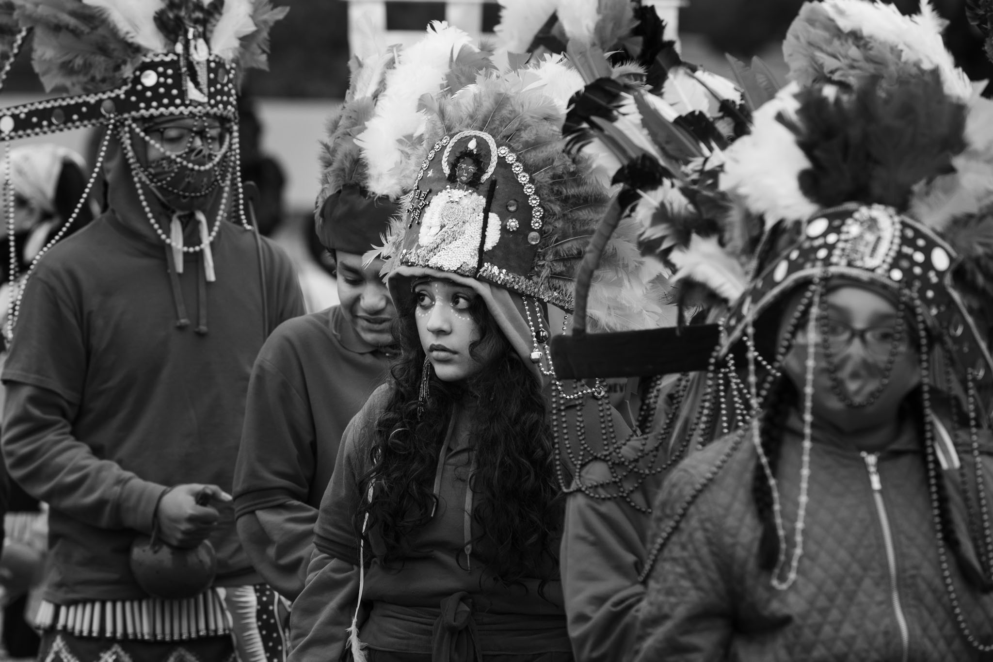 Matachines dancers in headdresses and beaded veils